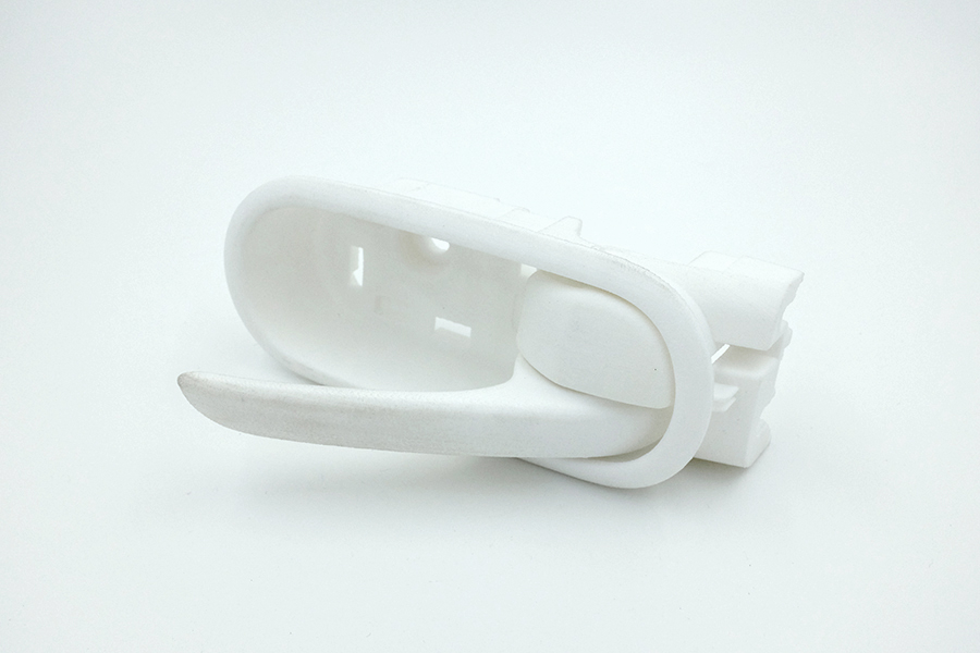 Automotive door handle made of PA12 nylon