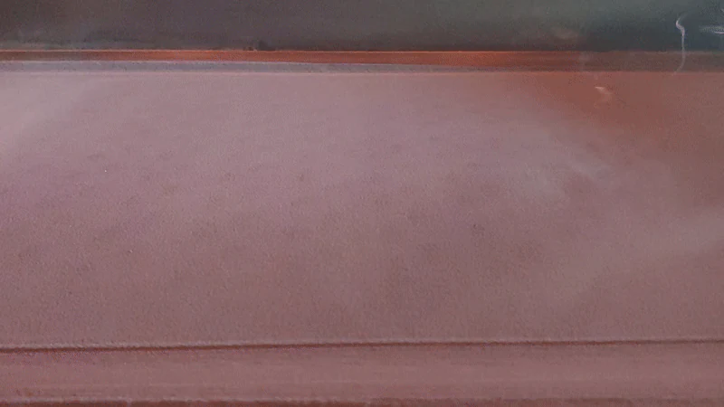 Selective Laser Sintering laser scanning a powder bed during production.